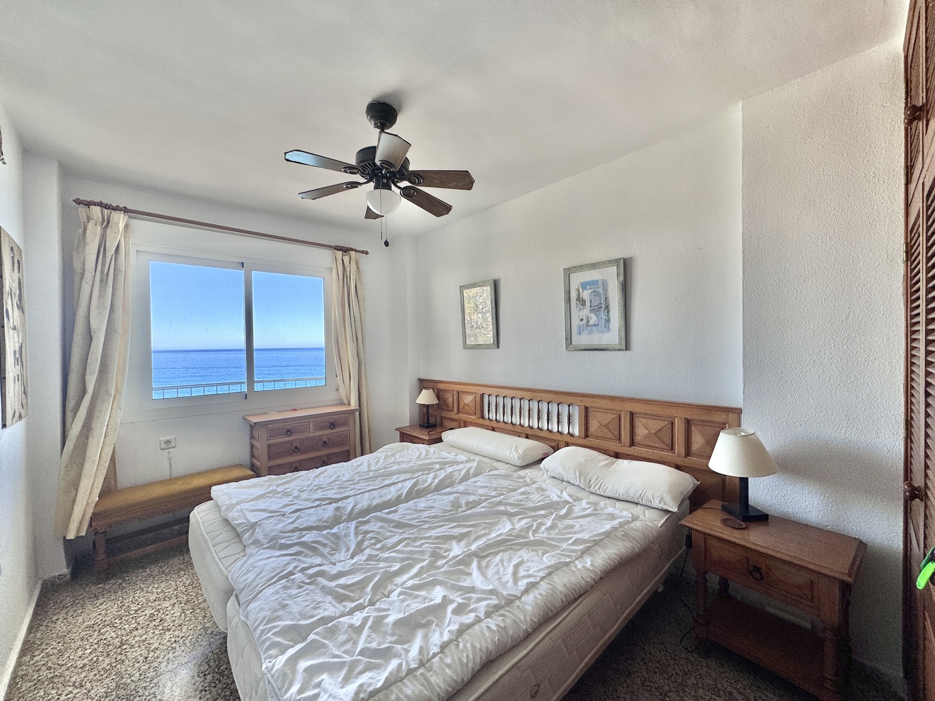 Main bedroom with double bed and sea views