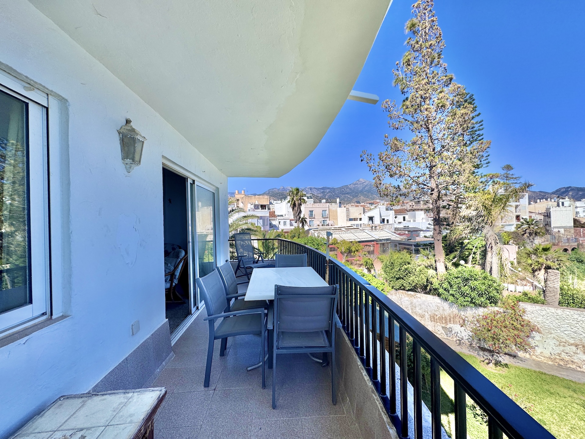 Terrace with mountain and urban views