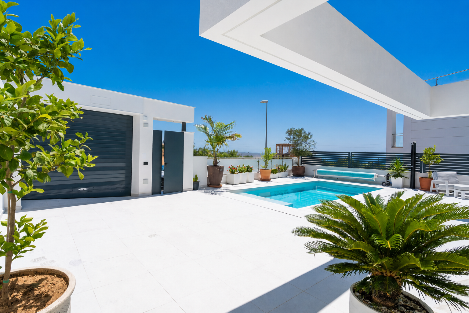 Open living-dining room with kitchen and terrace access