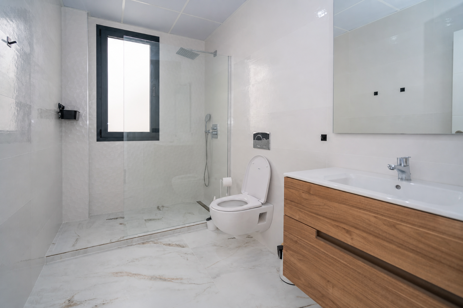 Full bathroom with shower and wood vanity