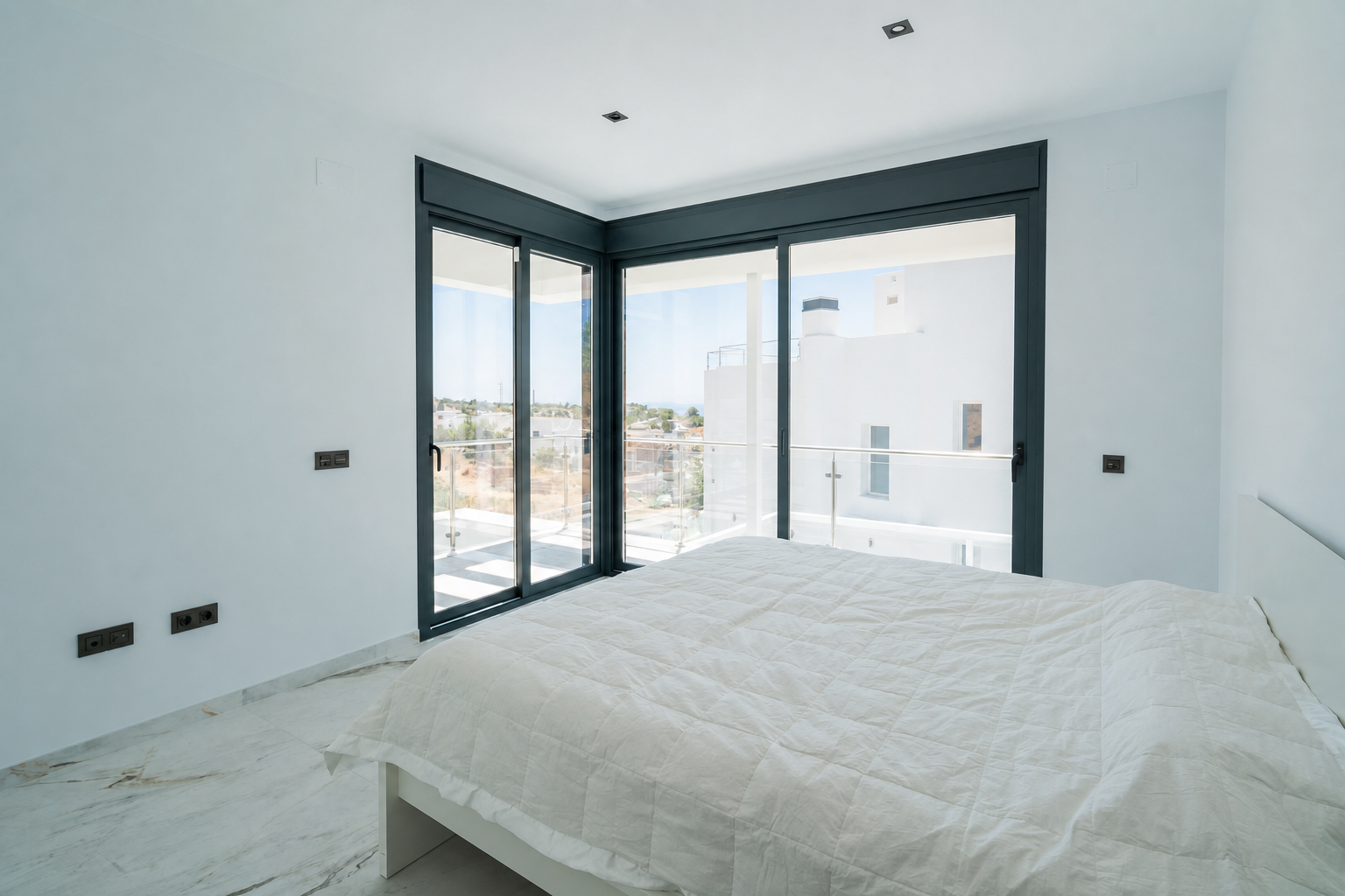 Main bedroom with terrace and open views