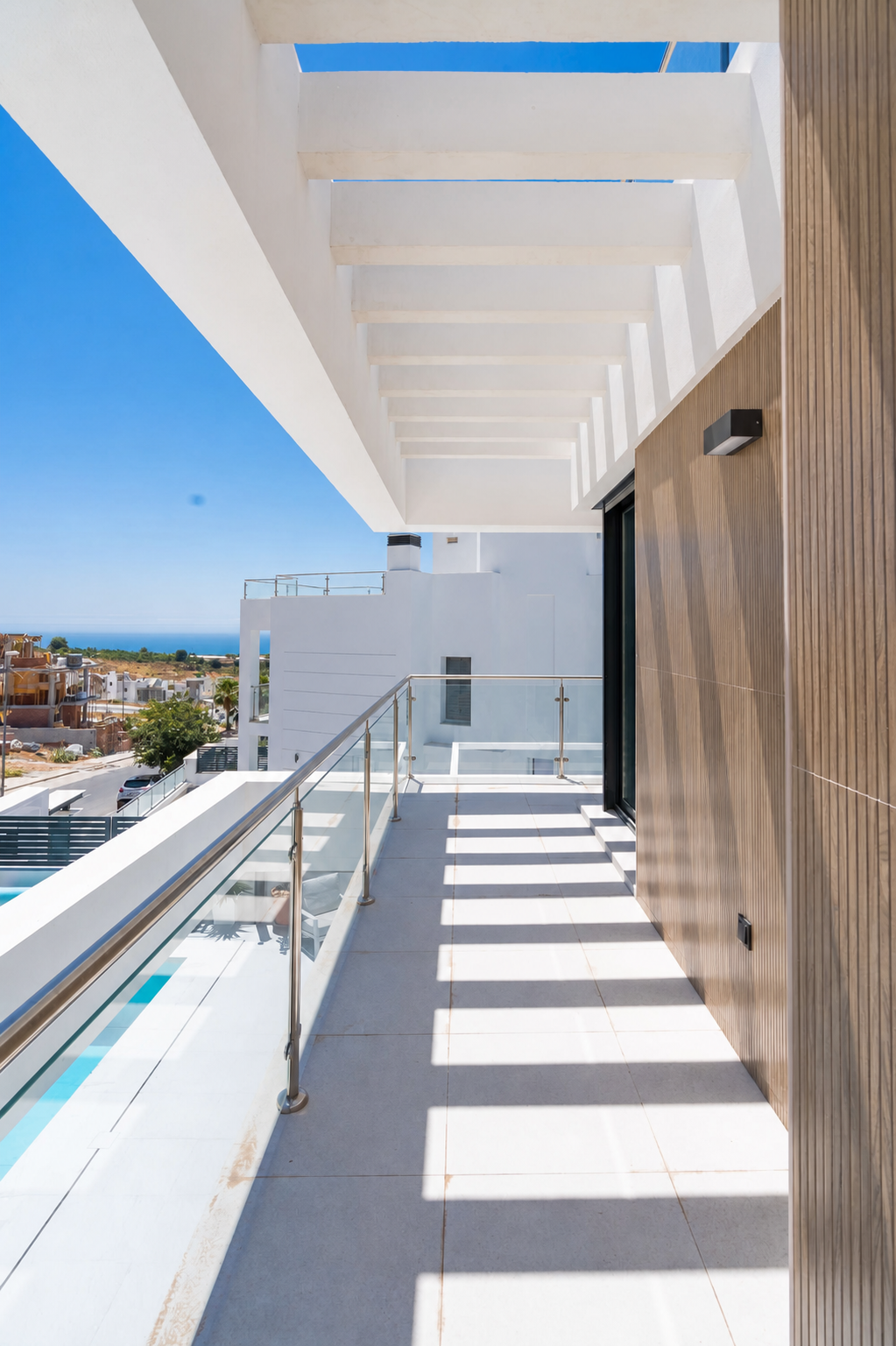 Upper terrace with sea and mountain views