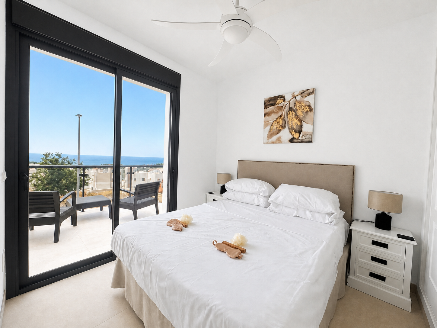 Bedroom with terrace access and sea views