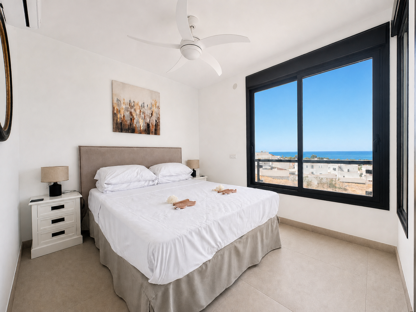 Bright principal bedroom with sea views
