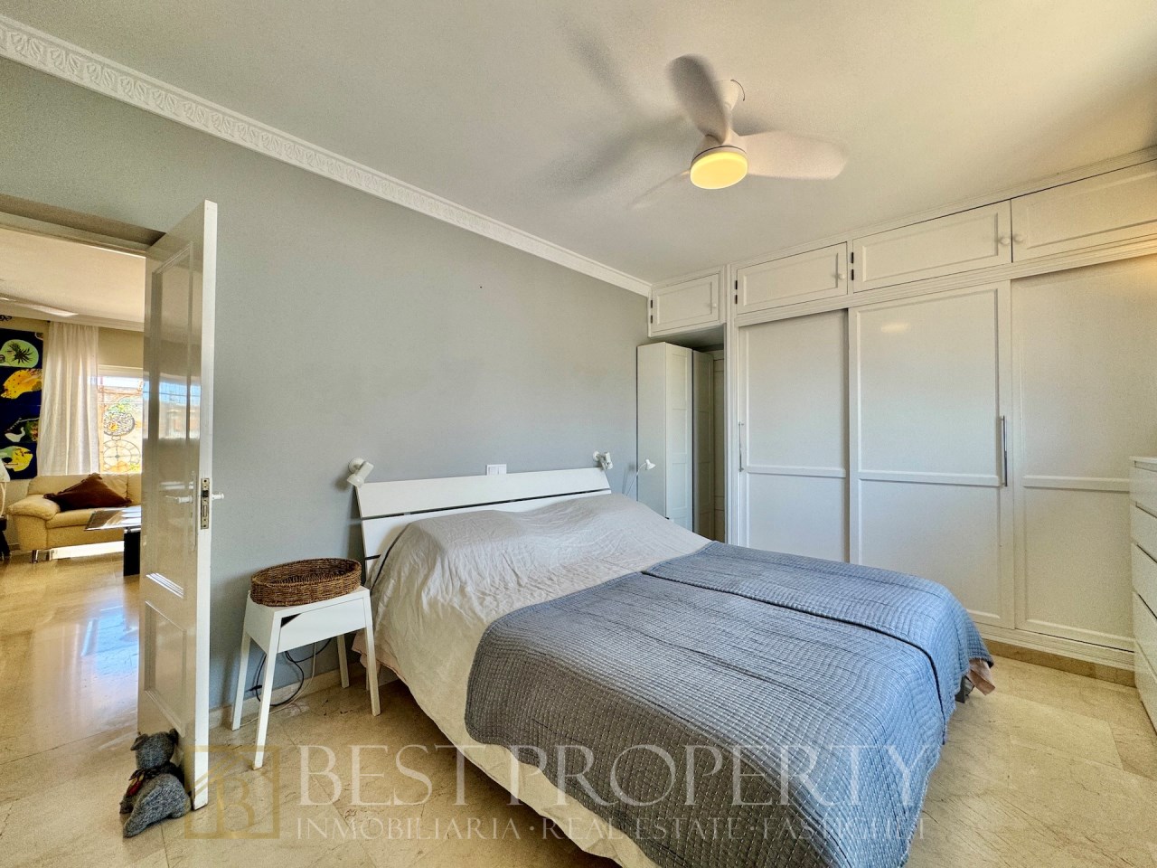Bedroom with built-in wardrobes and simple decor