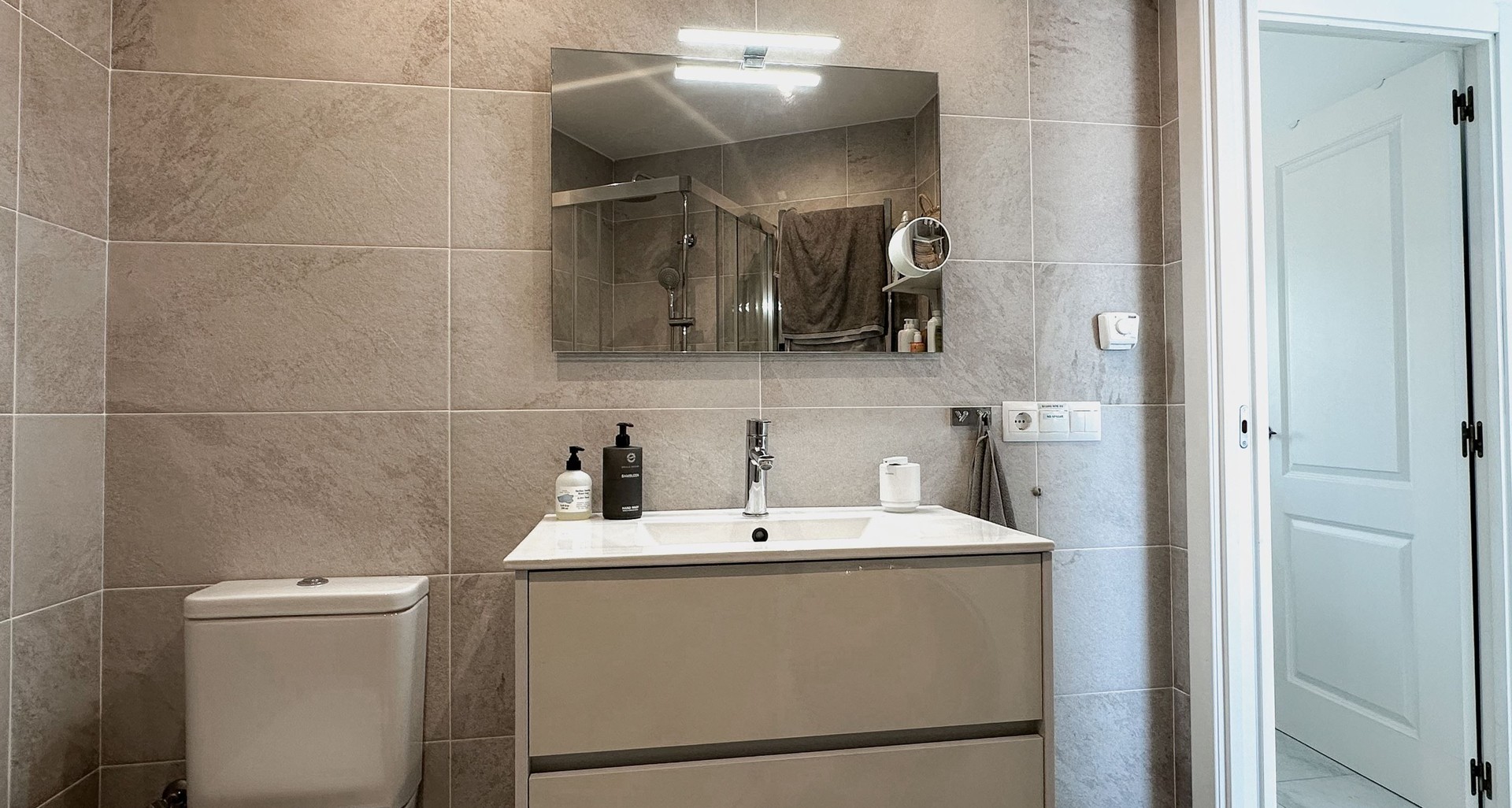 Bathroom with sink, toilet and shower