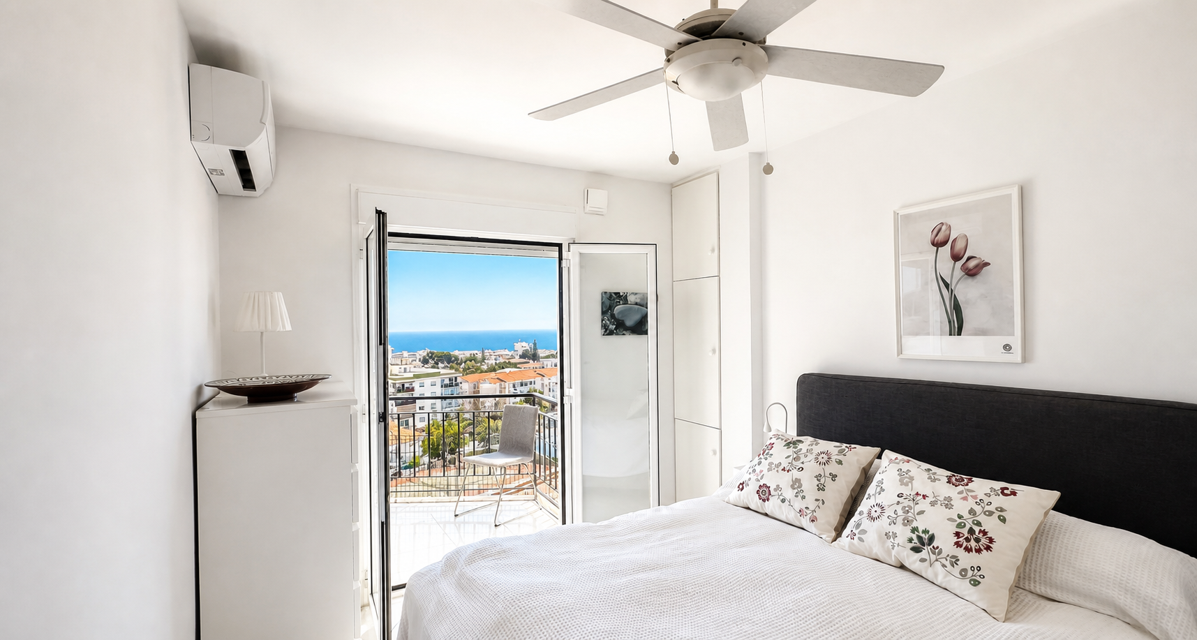 Bedroom with double bed and terrace access