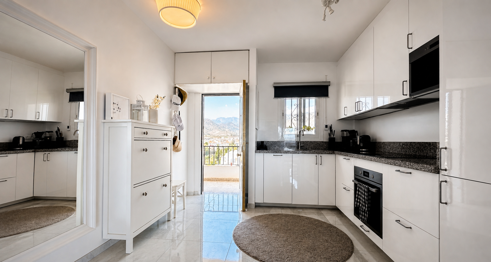 Modern white kitchen with outdoor access