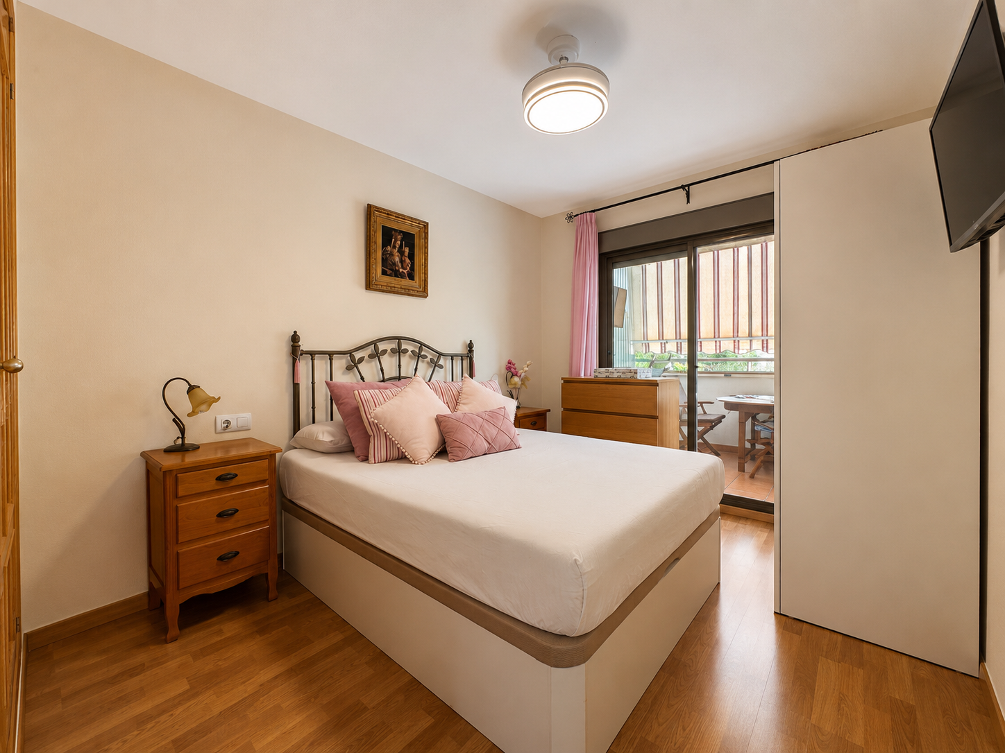 Main bedroom with double bed and terrace access