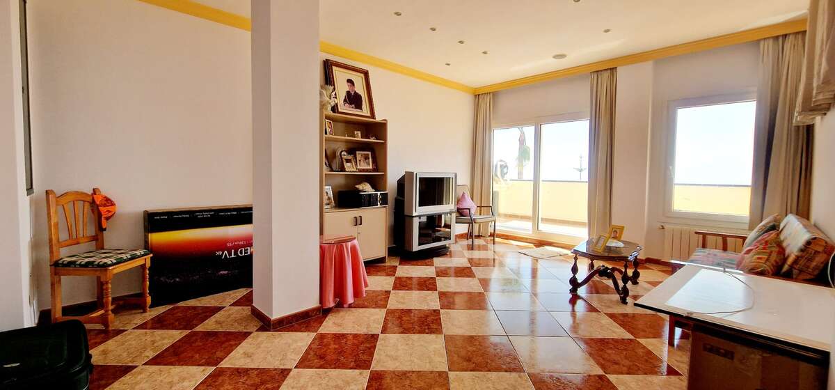 Large multifunctional room with terrace access