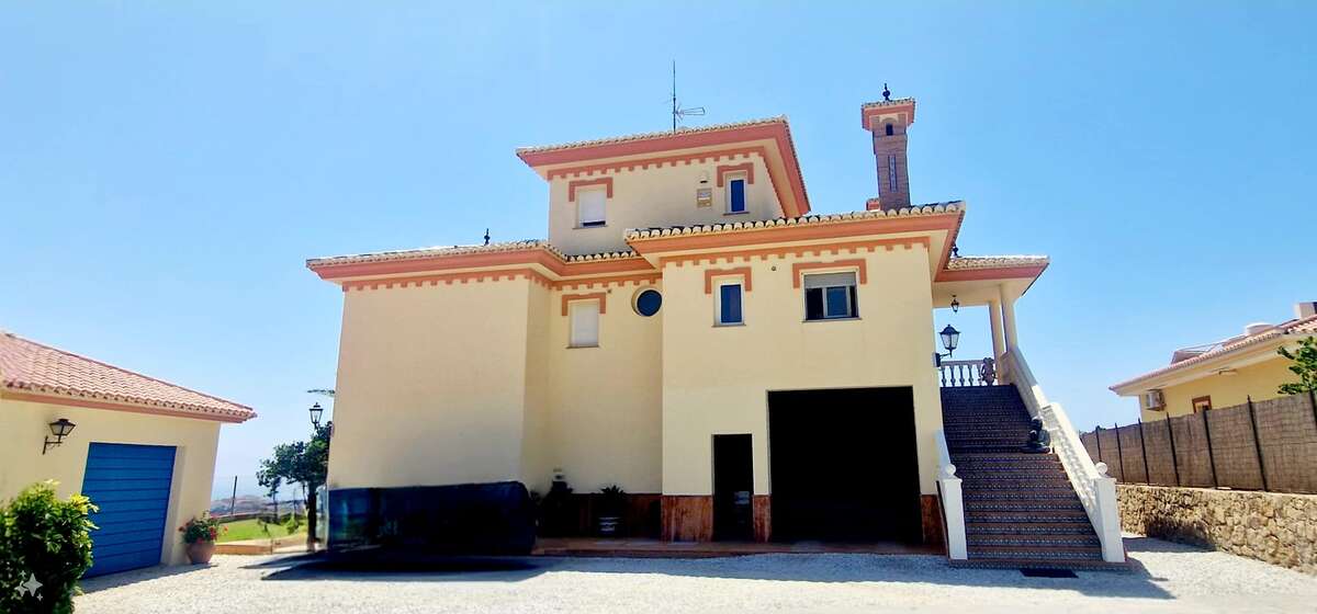 Rear facade of the villa with exterior stairs