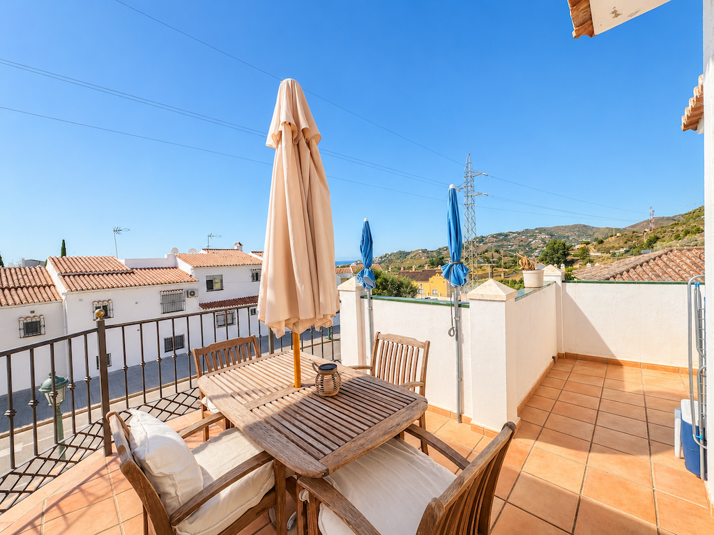 Terrace with dining area and open views