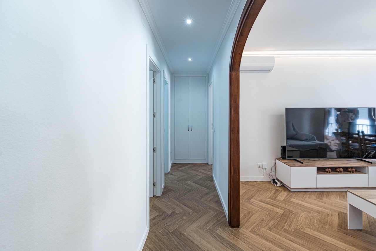 Hallway connecting living room and bedrooms
