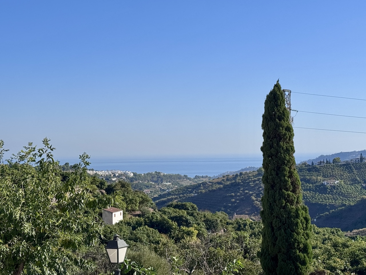 Panoramic sea and green hills views