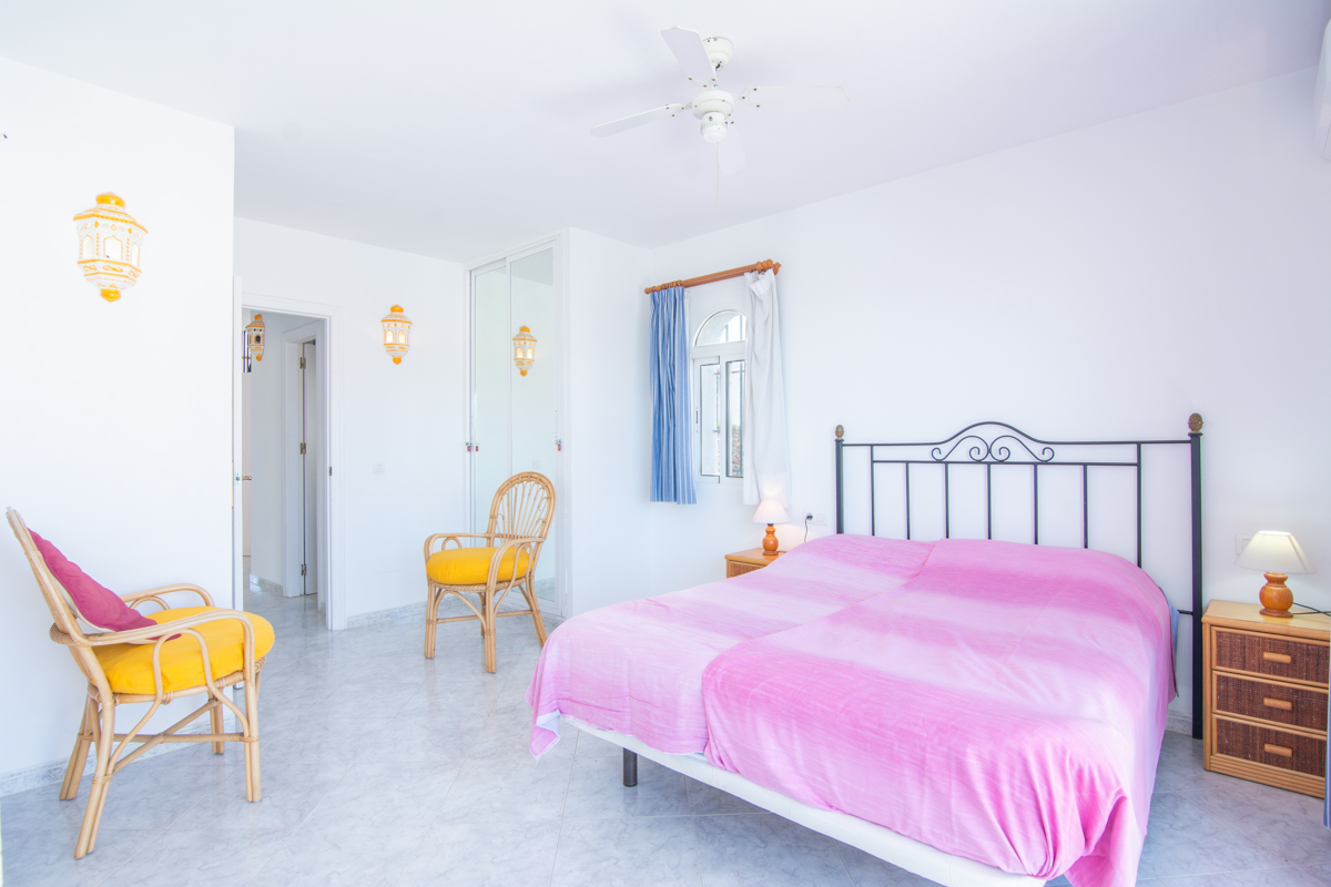 Spacious bedroom with double bed and exterior window