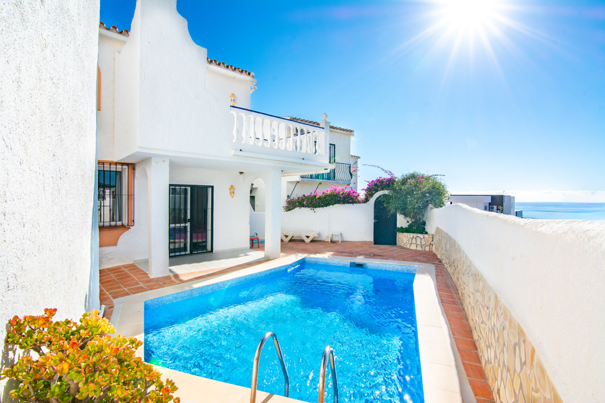 Private outdoor swimming pool next to the house