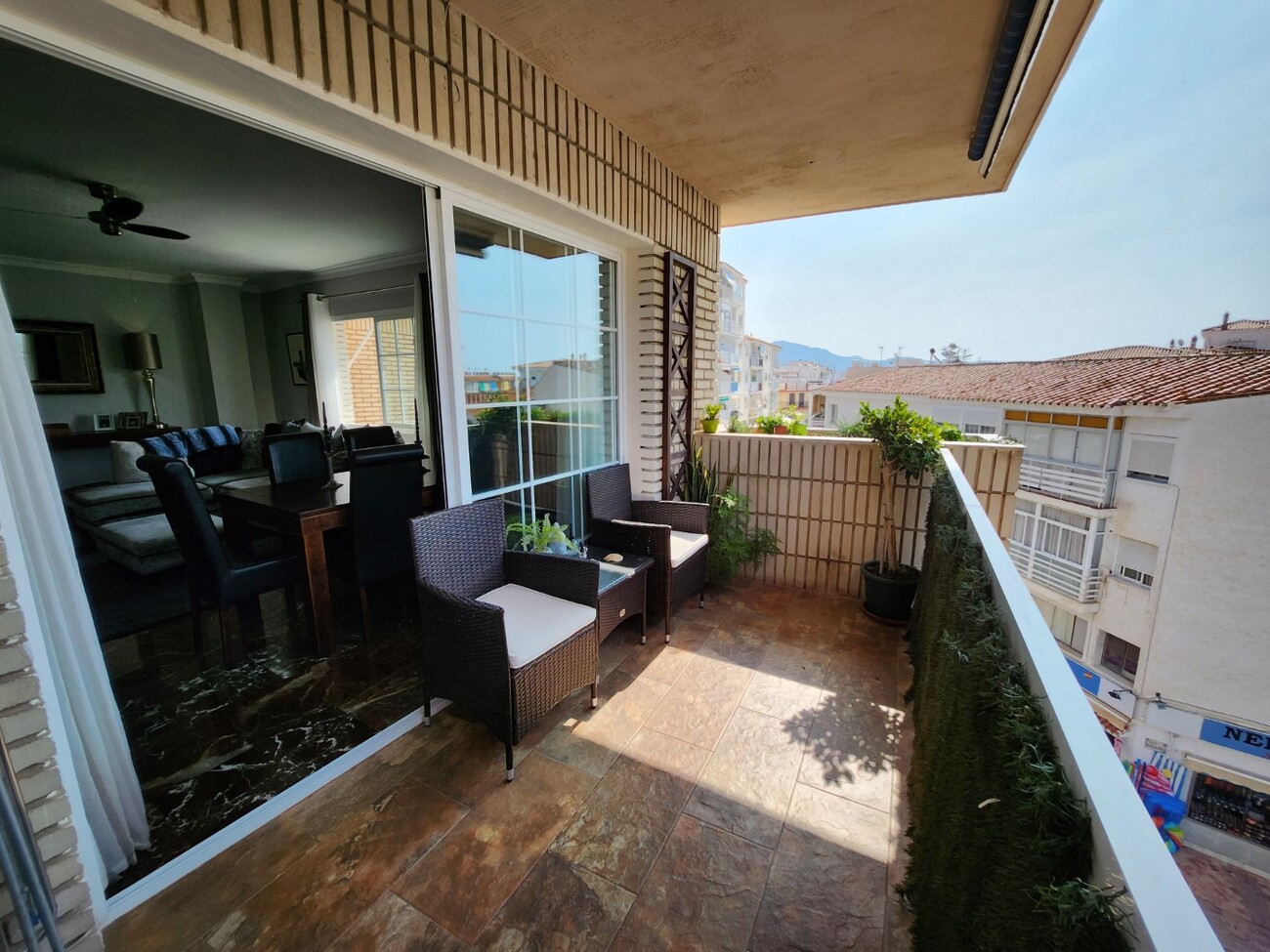 Terrace accessed from the living room with urban views