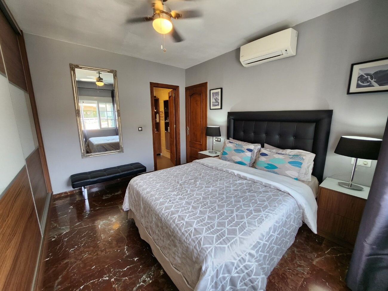 Main bedroom with double bed and built-in wardrobe