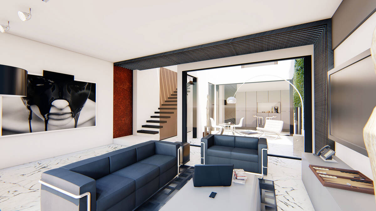Open living room with access to outdoor dining