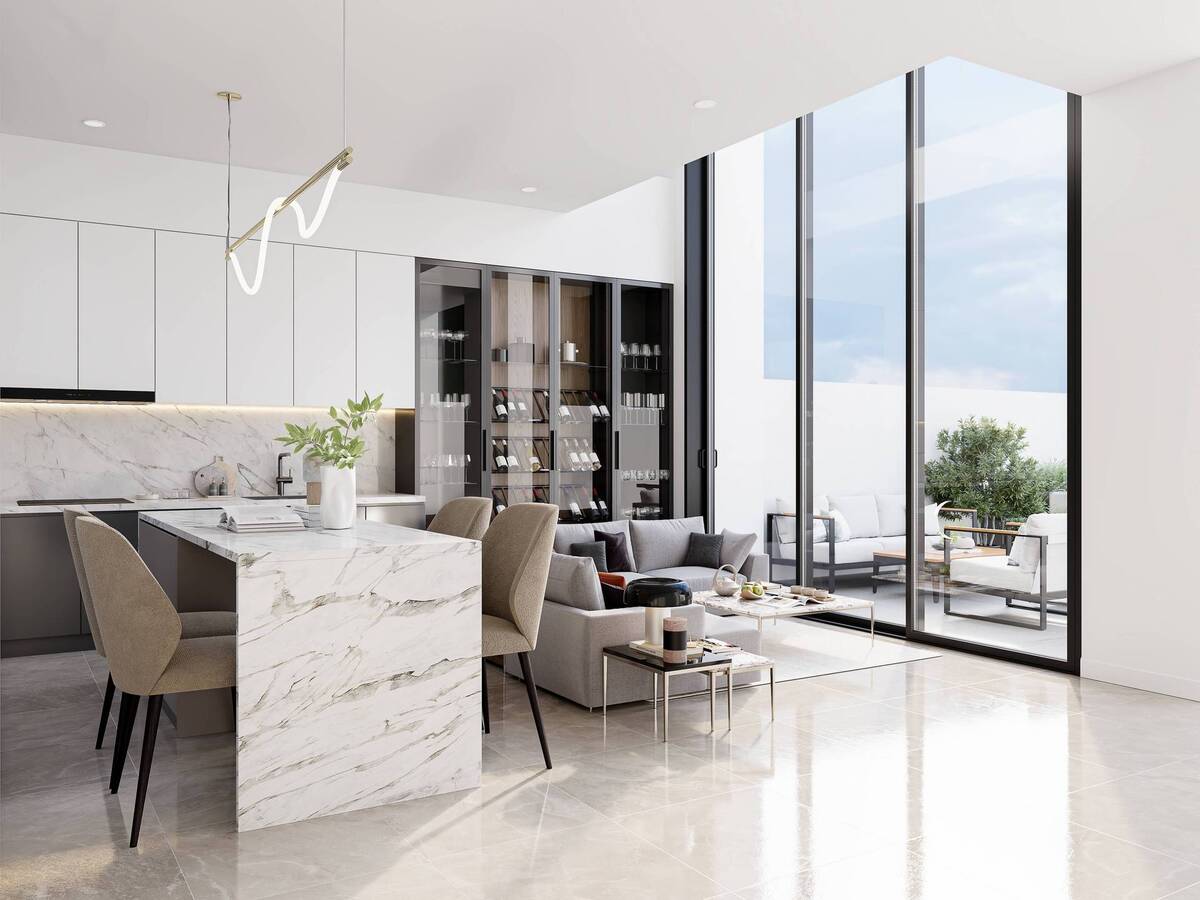 Open kitchen with island and integrated dining area