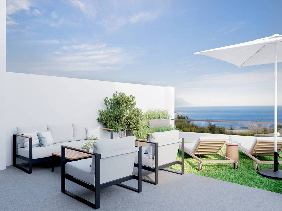Terrace with sofas, sun loungers and sea views